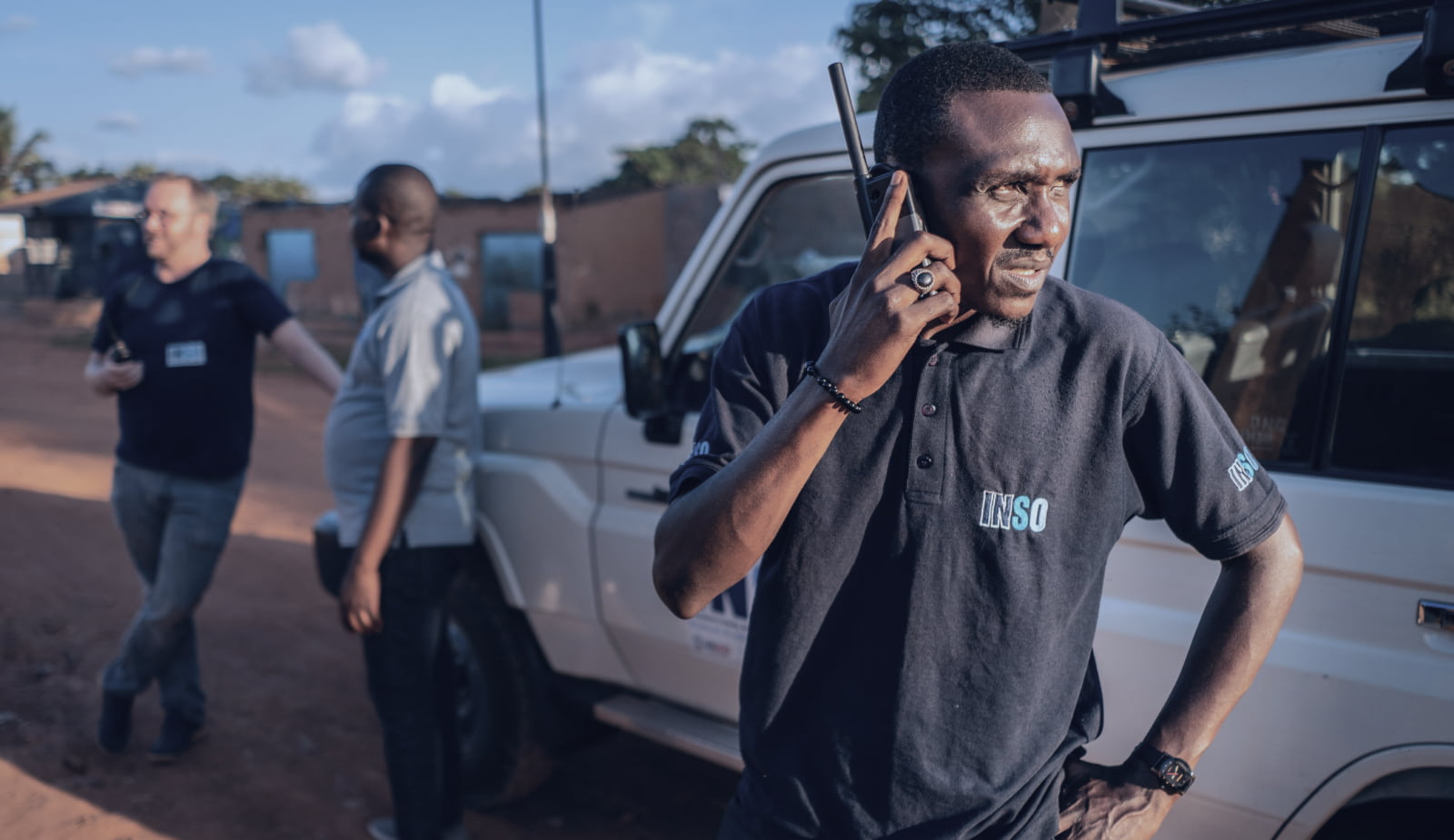 An INSO staff member uses a walkie talkie in Bangui, CAR. Credit: C. Di Roma/INSO﻿