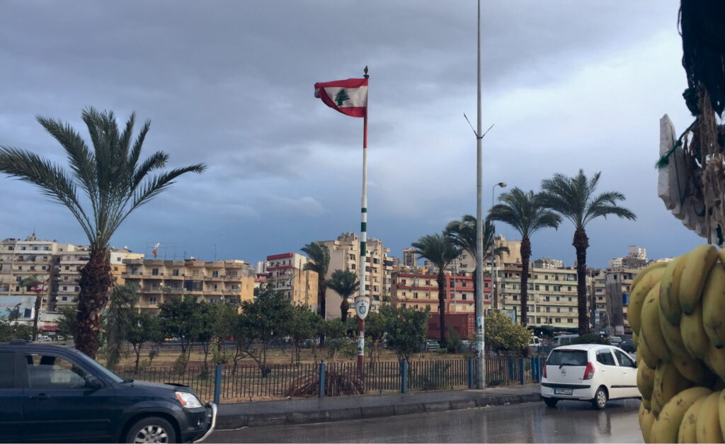 The Lebanese flag flies in Tripoli, Lebanon. Credit: Jessica Wanless/INSO