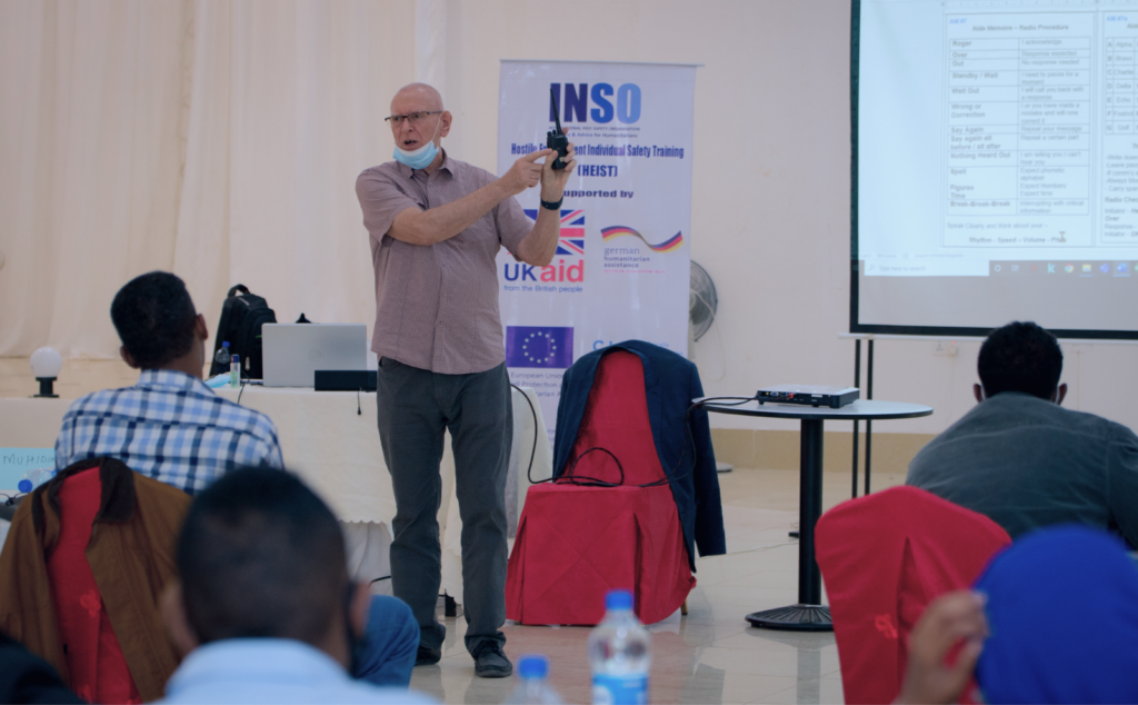 INSO trainer demonstrating use of a satellite phone in Somalia.